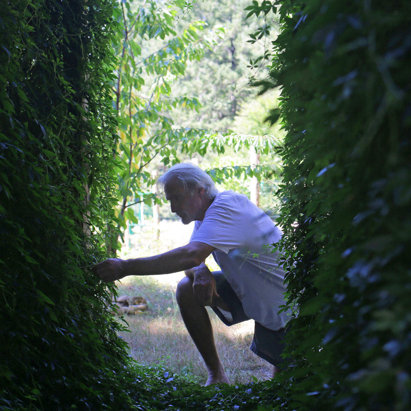 Dr. Barre Lando tending plants